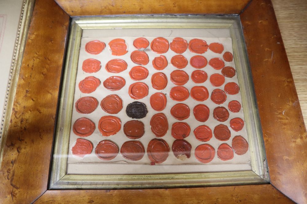 A framed group of intaglios and two framed groups of seals
